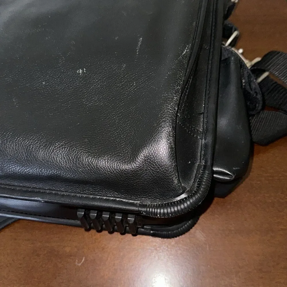 TARGUS Black Tech Padded Faux Leather Laptop Travel Bag with a Crossbody Strap